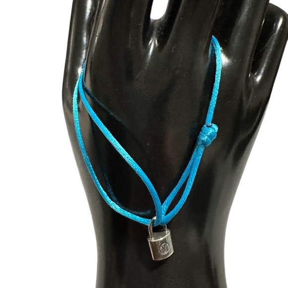 Vibrant Blue Bracelet with Mini Silver Louis Vuitton Lock...